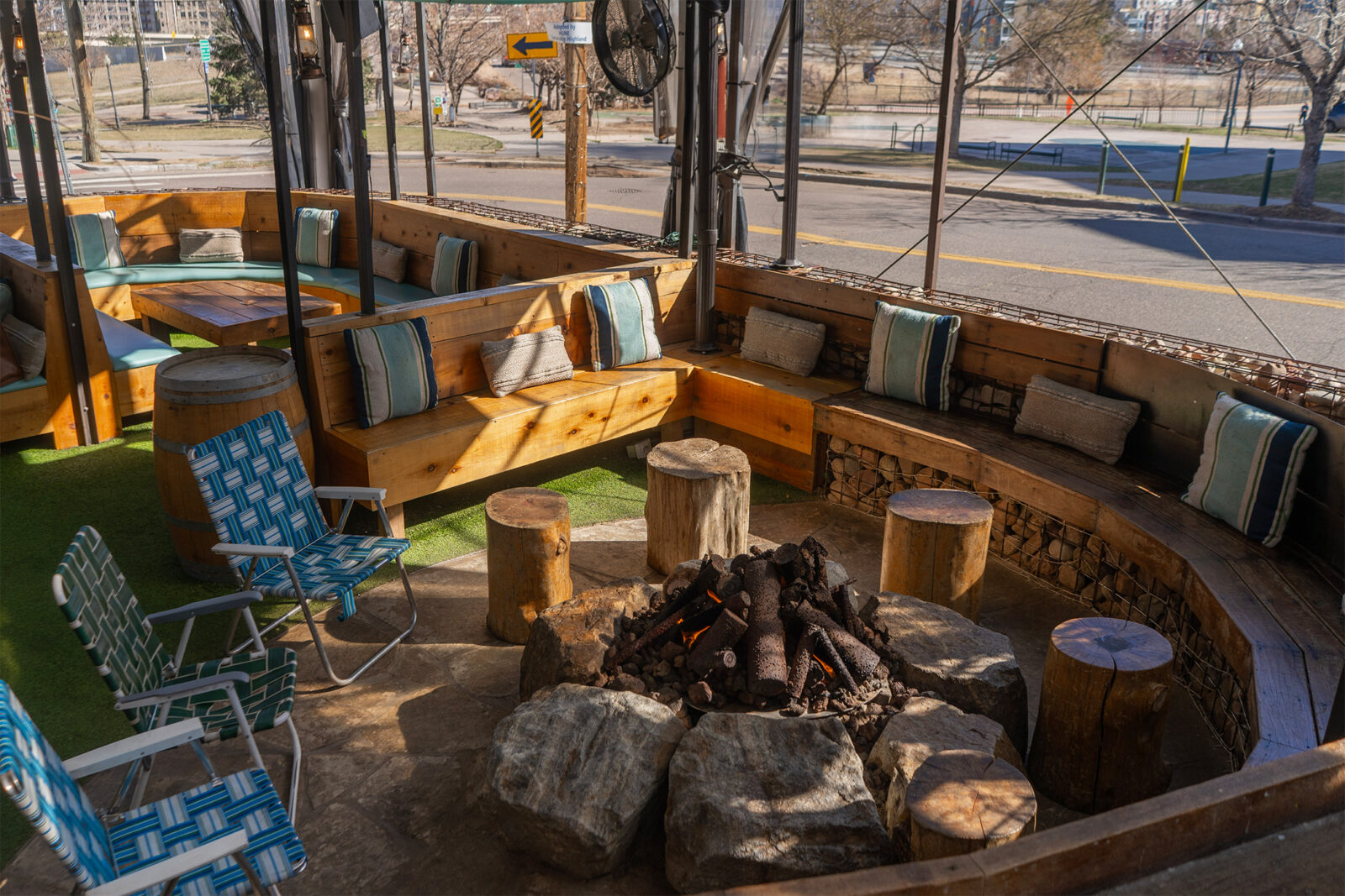 slide 1 of 3 - Semi circle seating around a campfire