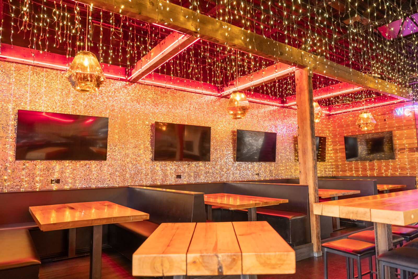 slide 1 of 3 - Inside restaurant, disco shimmer wall, booth seating