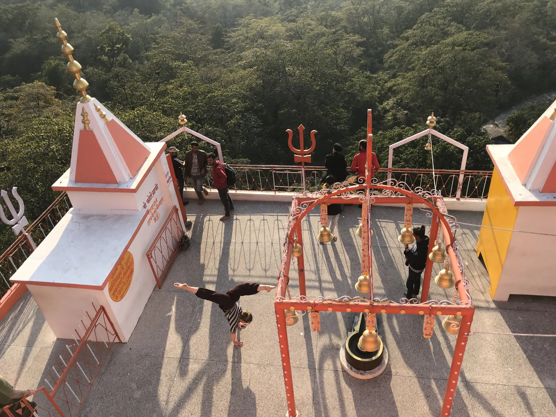 Handstand on a temple rooftop in India