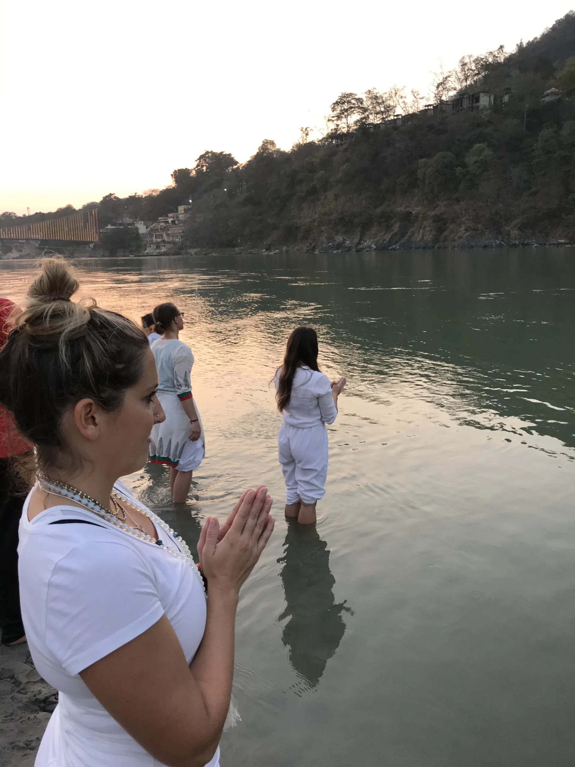 Spiritual ritual on the banks of the Ganges river at sunset