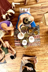 Matea Zajec, founder of Hari OM School, teaching yoga outdoors.
