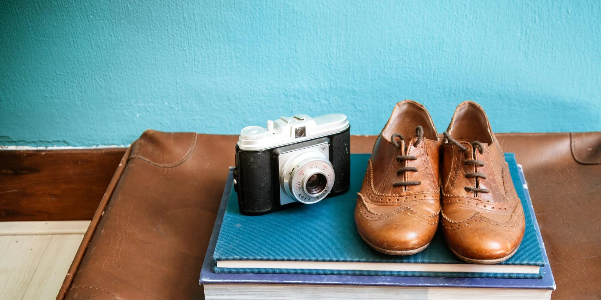 vintage still life with suitcase and shoes