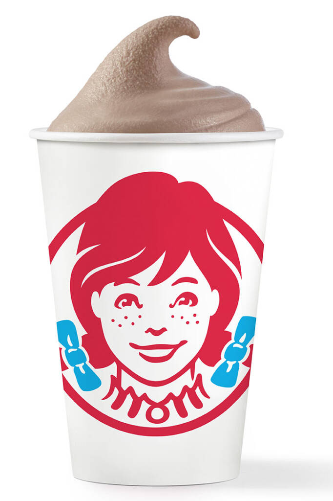 A white cup filled with a chocolate Frosty. The Wendy's logo is on the side of the cup.