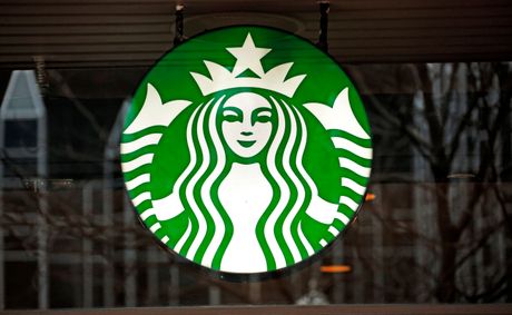 Starbucks reports record Q1 revenue but lowers outlook as consumer spending falls in some markets