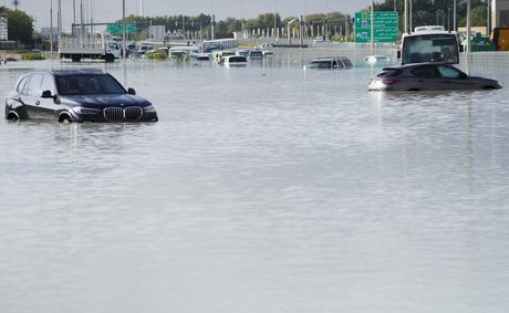 A storm dumps record rain across the desert nation of UAE and floods the Dubai airport