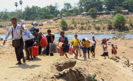 About 1,300 people from Myanmar flee into Thailand after clashes broke out in a key border town