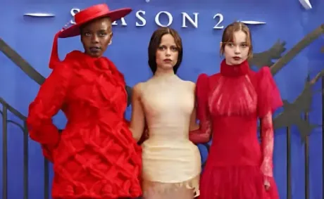 Emma Myers and Joy Sunday Spill Tea on New ‘Wednesday’ Season 2 + Fashion, Friendships and working w/Tim Burton | Watch