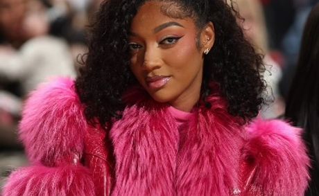 Angel Reese Turns Heads Courtside In Barbie Pink, Serving One Of Her Boldest Style Moments Yet