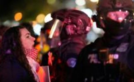 Second night of US protests over ICE shooting of woman in Minneapolis