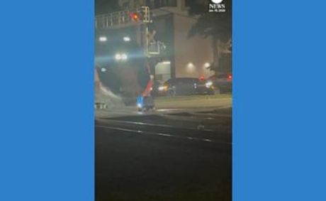 WATCH: Delivery robot demolished by train in South Florida