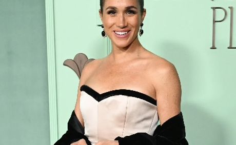 Meghan Markle Makes A Dramatic Entrance In A White Strapless Gown With Velvet Train At The 15 Percent Gala