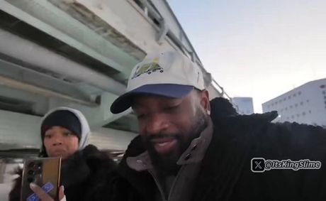 Gabrielle Union grabs Dwyane Wade and forces him to duck his head moments before he hits a low bridge in Japan [VIDEO]