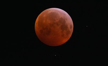 A rare lunar eclipse turns the moon a stunning red tonight
