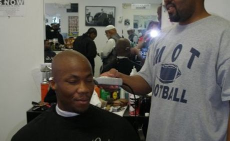 Inside a barbershop, Black men debate their political past and future