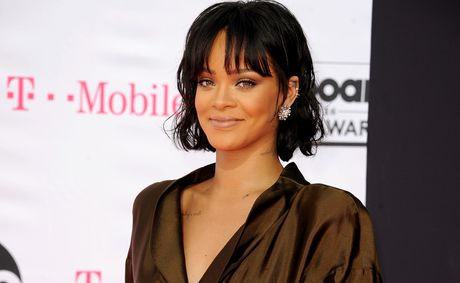 Rihanna stuns in red lingerie, but fans sense a secret