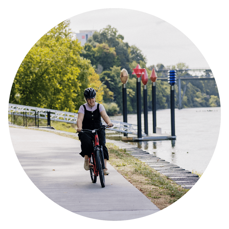 Person riding a bike along the Hamilton section of the Te Awa River ride