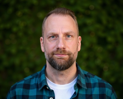 Professional AI headshot example created by HeadshotPro - male business portrait