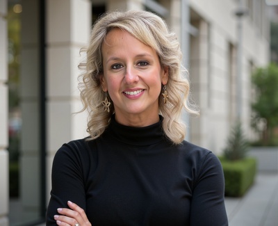 Professional AI headshot example created by HeadshotPro - female business portrait