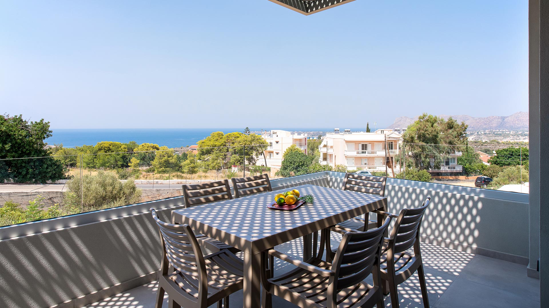 Outdoor table on the balcony with a sea view