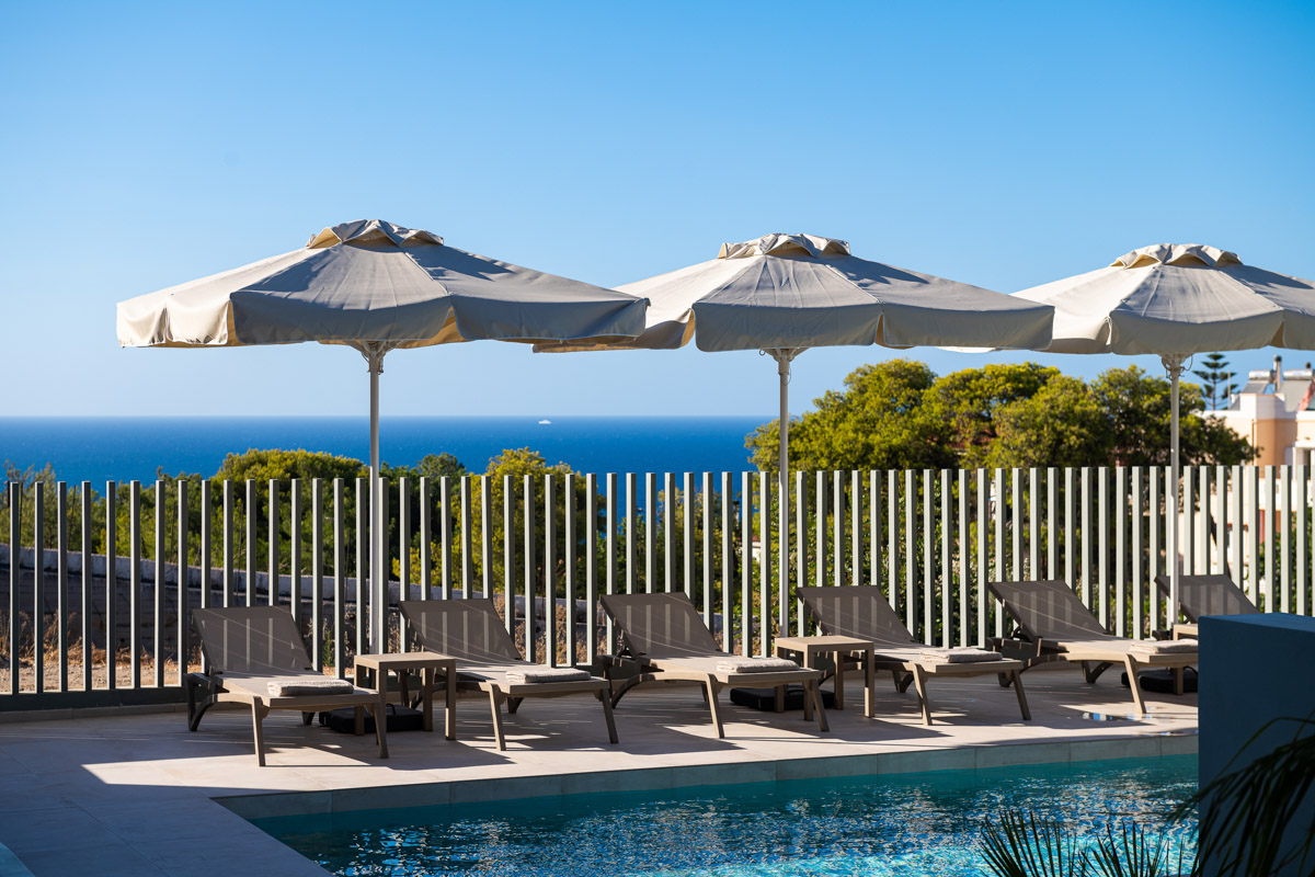 Sunbeds under the umbrellas