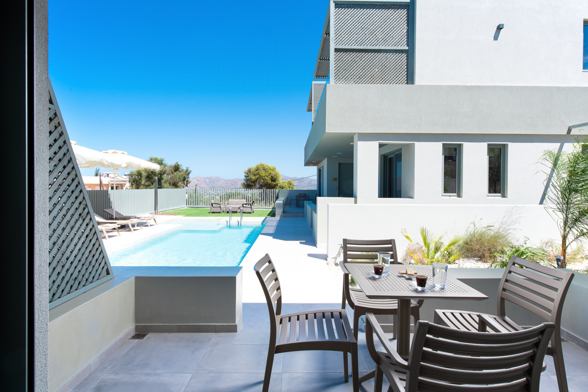 Balcony table and the pool behind it