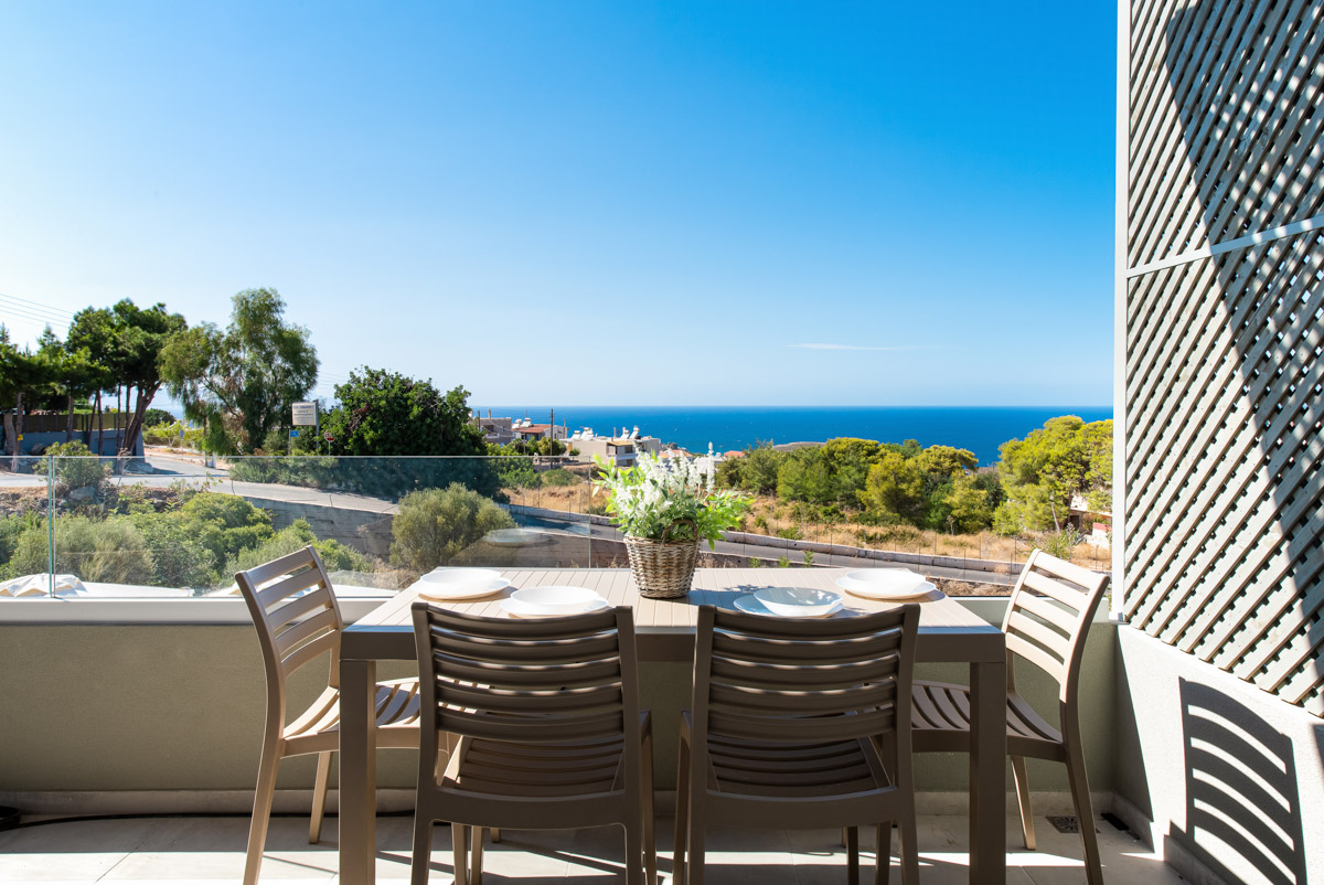 Balcony with sea view and outdoor table