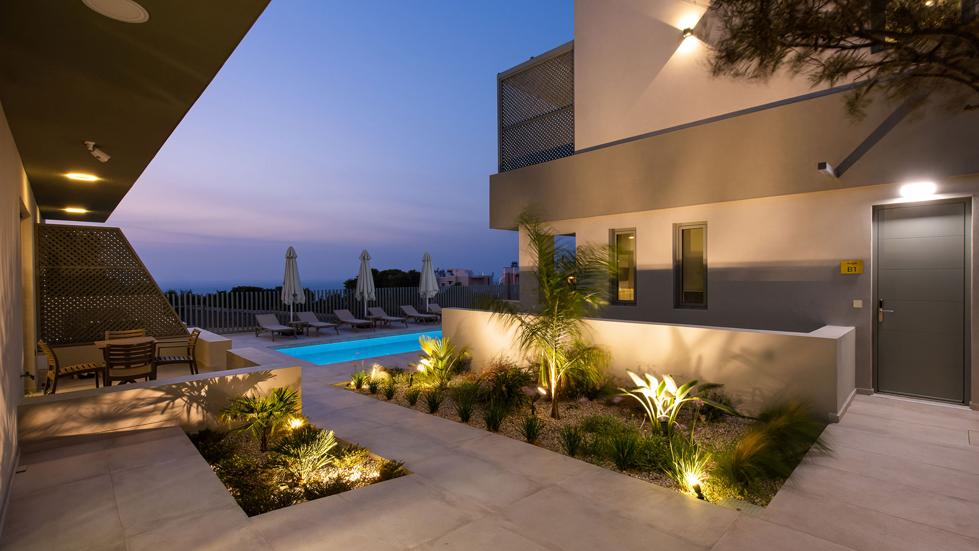 Garden and pool by night