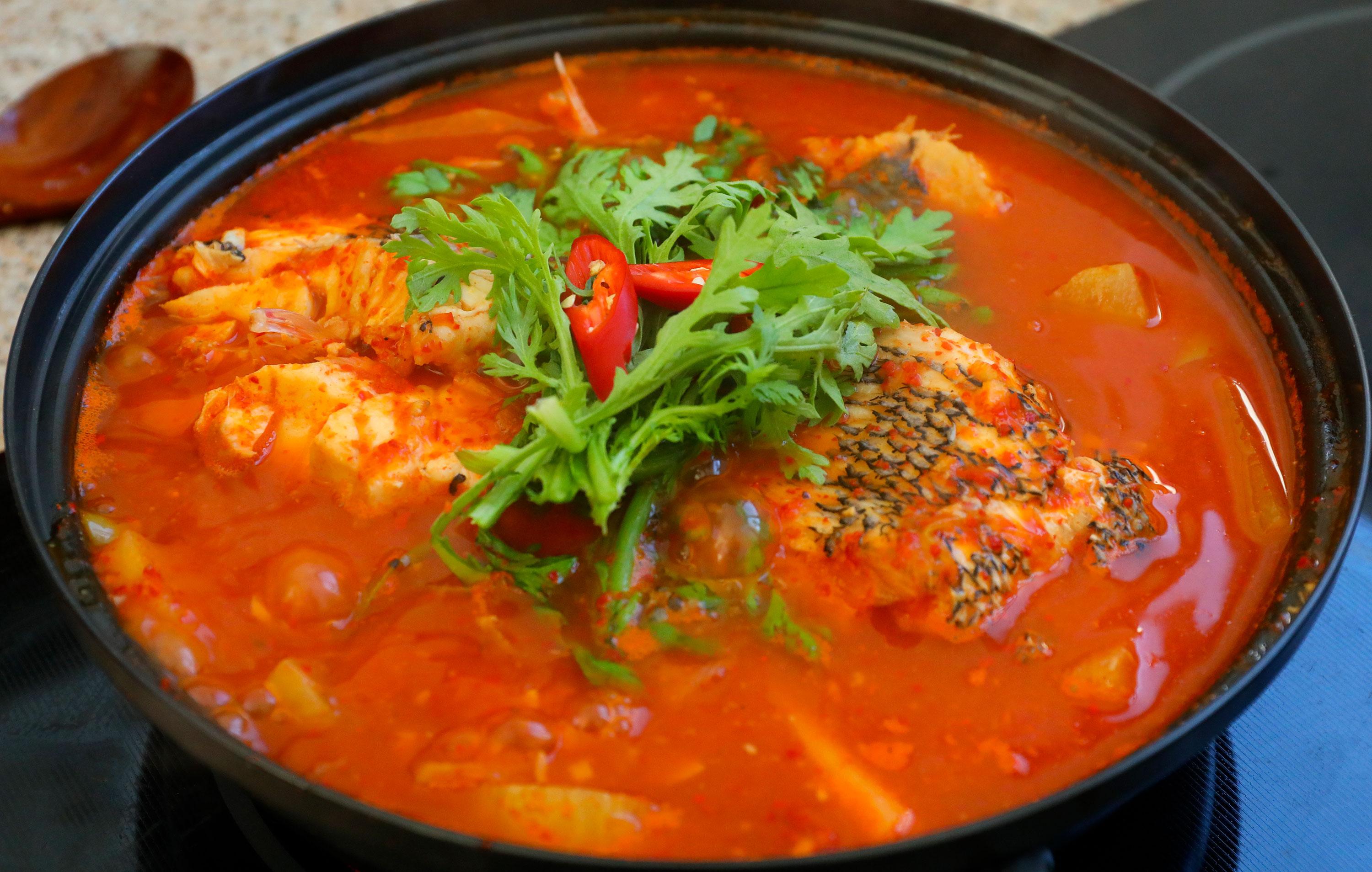 Spicy Fresh fish stew with boiled rice