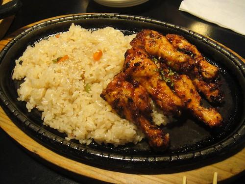 Crispy chicken legs with fried rice