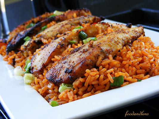 Jollof rice and goat skewers