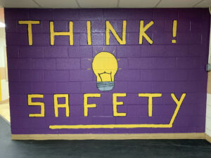 "Think Safety" painted on a wall