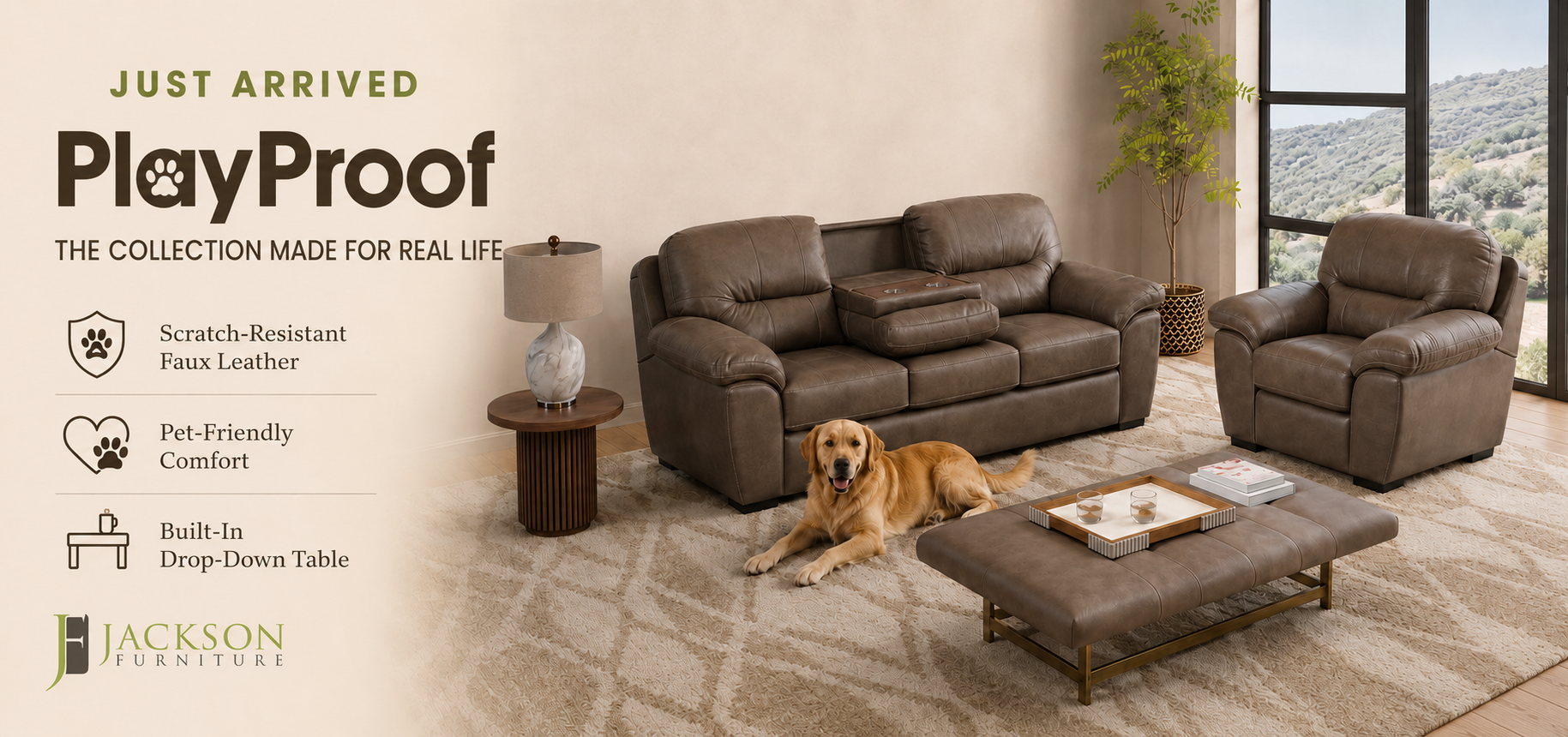 Promotional banner for Jackson Furniture's PlayProof Collection featuring a brown faux leather sofa, matching armchair, ottoman, and side table set in a living room with a golden retriever lying on the rug. Text highlights scratch-resistant faux leather, pet-friendly comfort, and a built-in drop-down table.