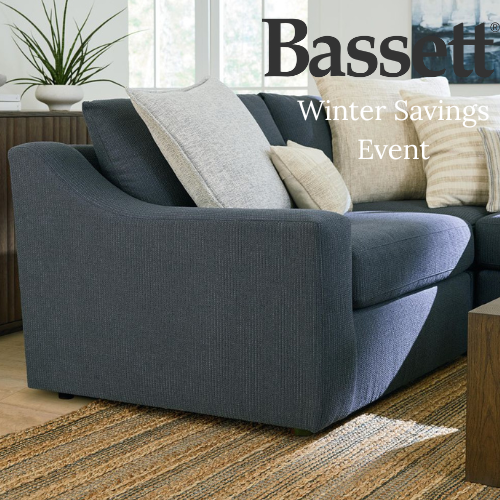 A circular coffee table featuring a thick, drum-style top made of weathered wood with a sunburst-patterned grain on the surface. The top is supported by four black metal hairpin legs. A black sale badge indicates the price has been reduced from $529.99 to $279.30.