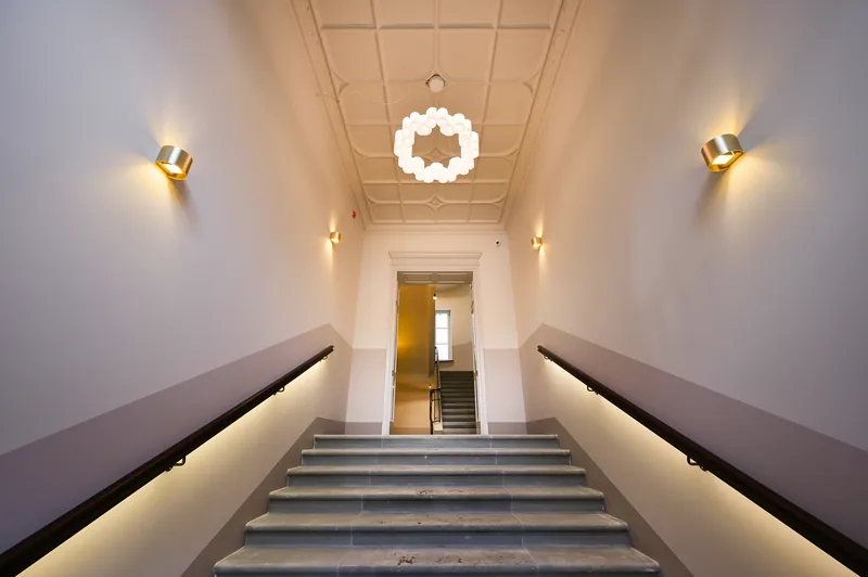 Restored historic staircase inside the HIDE building