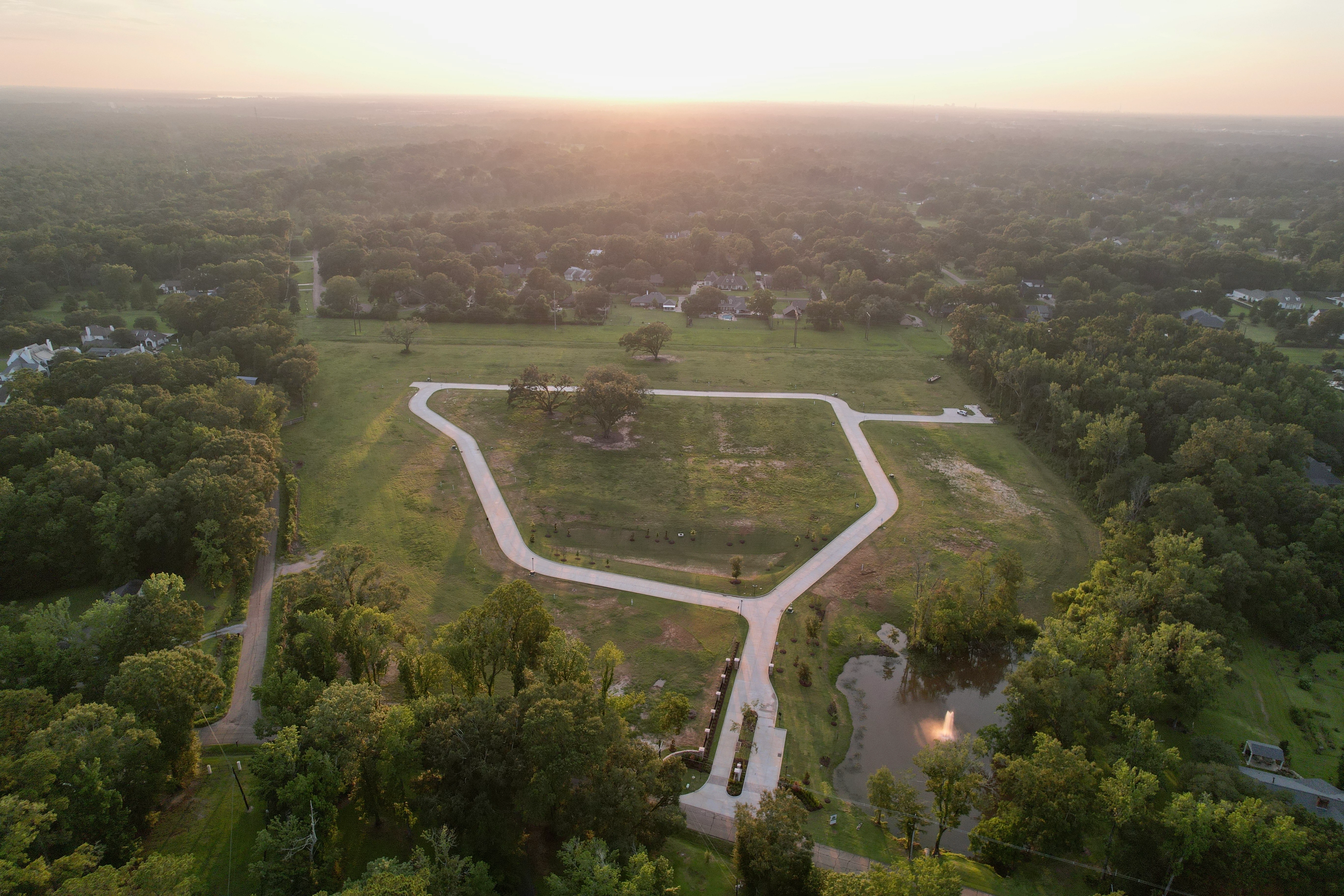 Final landscaping across the eighteen acres of Highlake