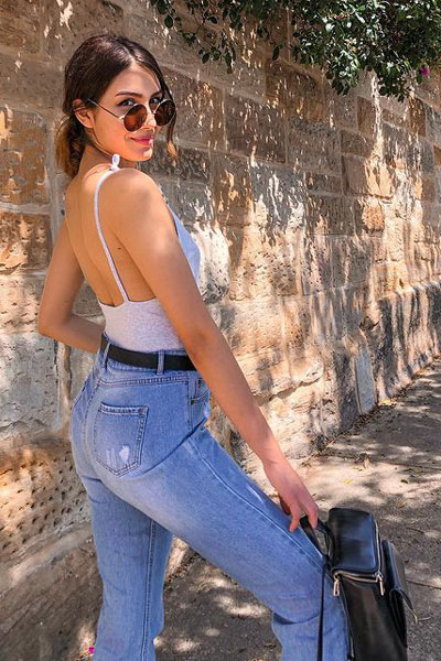 jeans + crop top for summer. 23 Summer Vacation Outfits To Make Your Next Trip Stylish