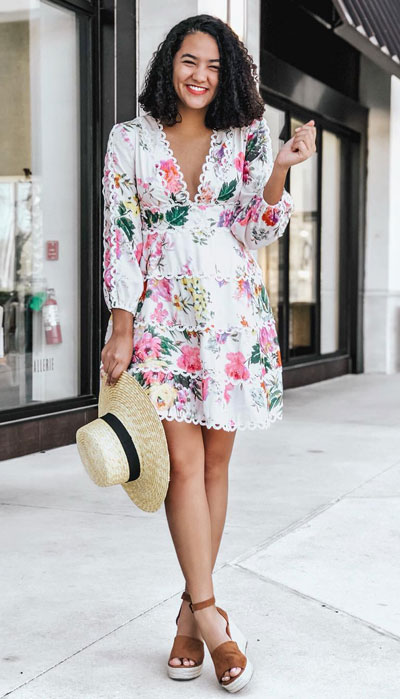 For your next trip, try wearing a V-neck floral dress with tiered scallop details. Don't forget to bring some beachy straw hats and wedge kicks to feel a little more special look. 23 Summer Vacation Outfits To Make Your Next Trip Stylish