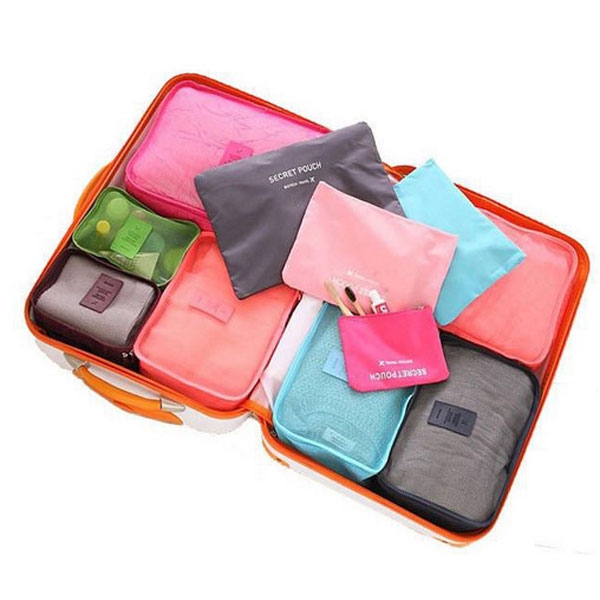 Gunakan tas-tas kecil (packing cube)