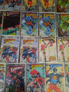 Lot of 21 DC Comic Books Superboy 1990s board and bagged duplicates