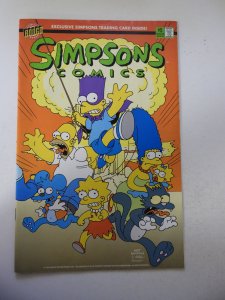 Simpsons Comics #5 (1994) FN+ Condition Trading card intact