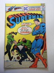 Superman #297 (1976) VG+ Condition moisture stain fc