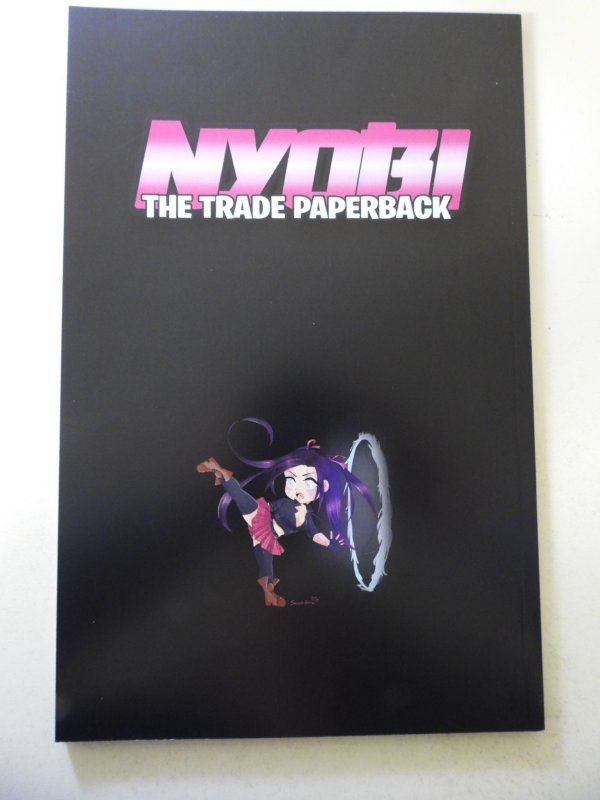 Nyobi  Trade Paperback Signed- no cert VF/NM Condition