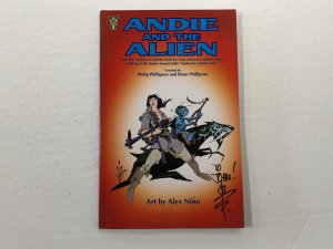 *Andie and the Alien trade paperback signed by Alex Nino, vf