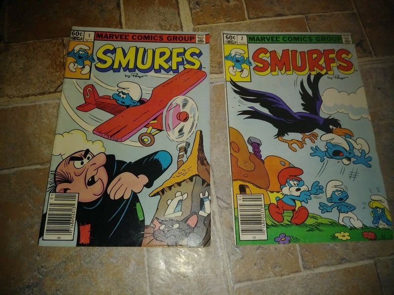 the  smurfs  comic # 1 +2 , 1982 marvel  papa smurf +gargamel +