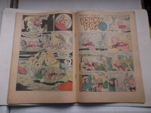 DELL (FOUR COLOR) PORKY PIG IN ROARING ROCKETS, W/BUGS BUNNY COVER, 1951, VG!