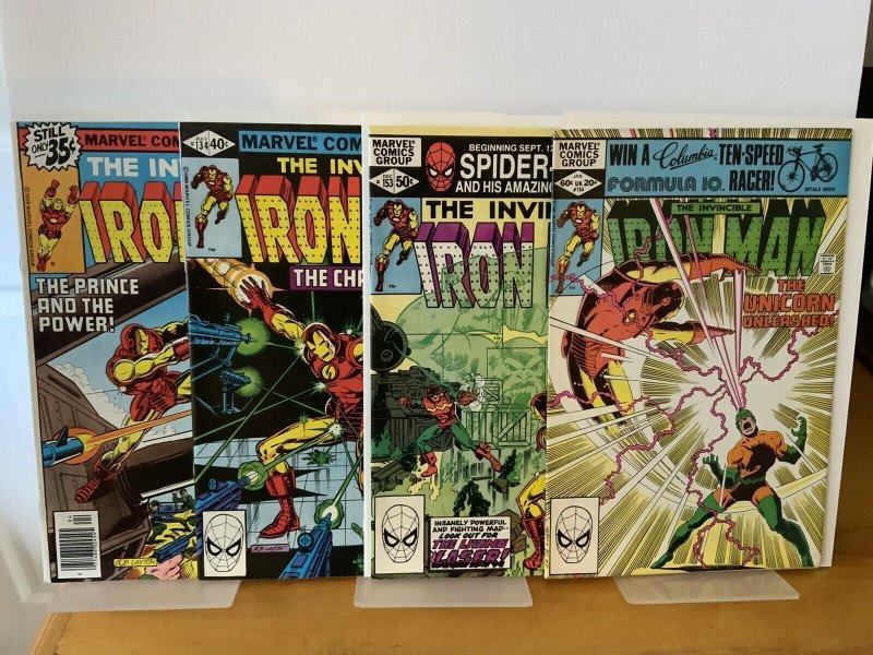 Iron Man lot 121, 134, 153, 154 mid/hi grade lot 153 has sm tear on back cover.