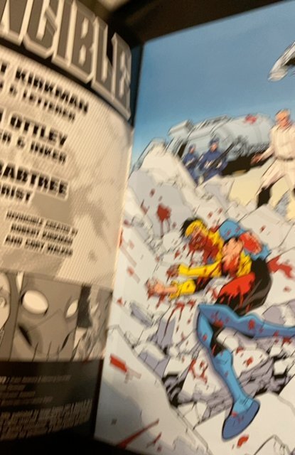 Invincible #13 (2004) invincible is pummmelled