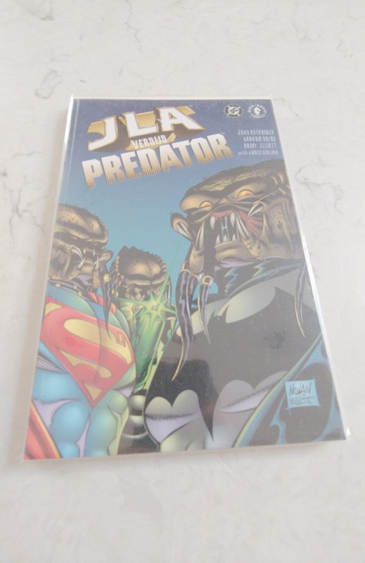 JLA Versus Predator #1 (2001)