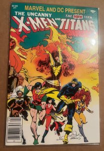 Marvel and DC Present featuring  X-Men and The New Teen Titans (1982) NM