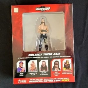 WWE Championship Seth Rollins Figure With Collectors Magazine